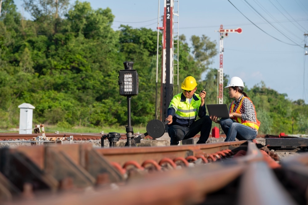 Engineer working on maintenance inspection in railway station