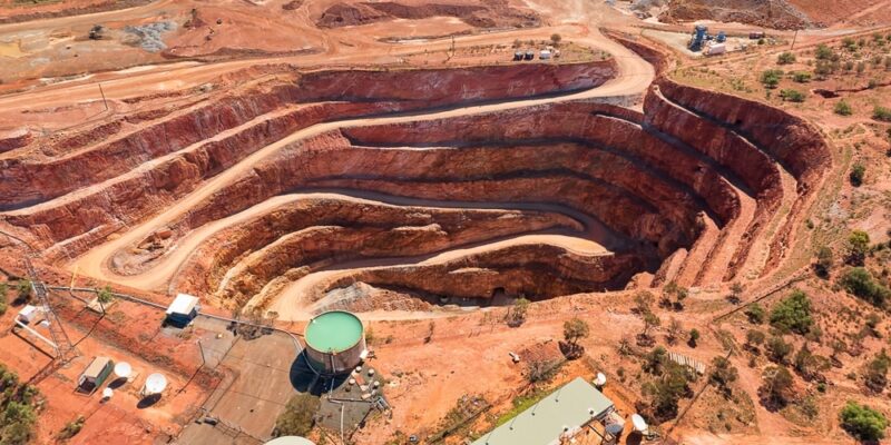 Aerial view of open-pit copper mine and red Outback soil near Cobar, Australia